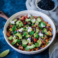 vegan sweet potato nachos in a serving platter