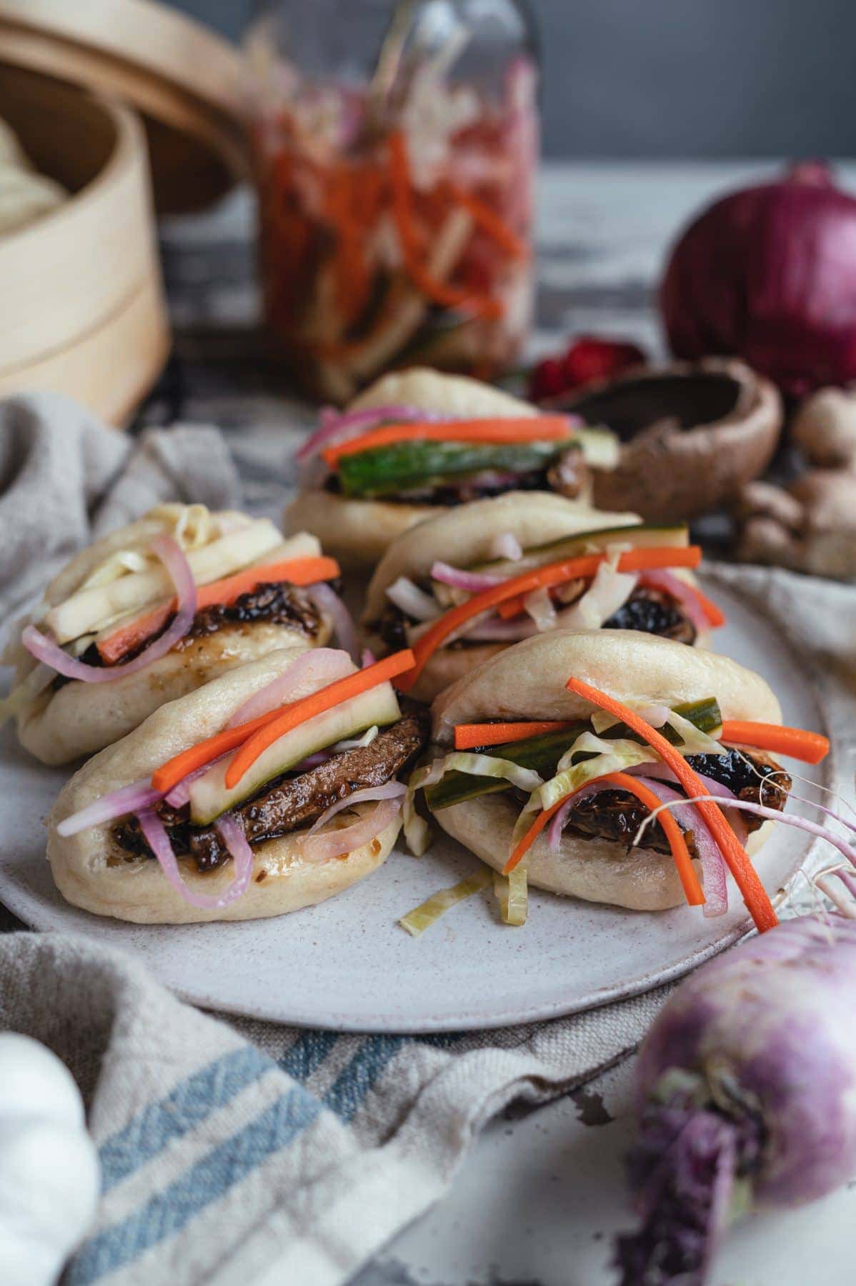 closeup of Vegan Bao Buns with Hoisin Mushrooms and Pickled Vegetables