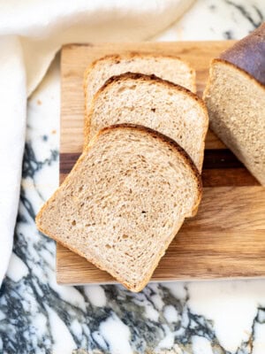 Sliced whole wheat sourdough sandwich bread with soft crumb